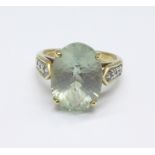 A 9ct gold, light blue stone and diamond ring, 4.7g, N