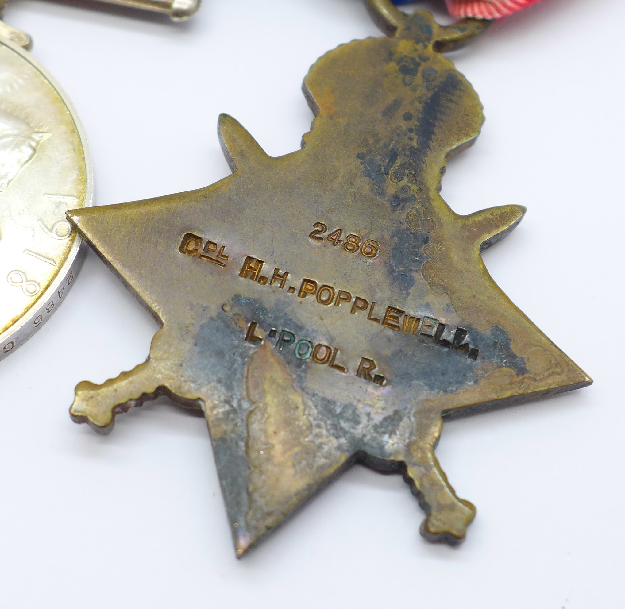 Four medals; WWI trio and Territorial Efficiency medal to 2486 Cpl. H.H. Popplewell 10/L'Pool R. - Image 6 of 11
