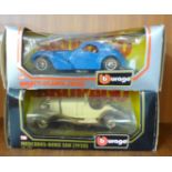 Two Burago die-cast cars, Mercedes-Benz SSK (1928) and Bugatti Atlantic (1936), boxed