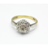 An 18ct gold and diamond cluster ring, 3.1g, K