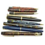 Three pens with 14ct gold nibs, one a/f, two other pens, a silver pencil and three other pencils