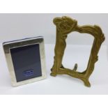 A silver photograph frame, 8cm x 10.5cm, and a brass photograph frame