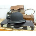 A black case containing hankies, etc., a Ridgmont bowler hat and three handbags