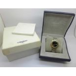 A Longines Admiral wristwatch, bi-metal 18ct gold and steel, with box and papers