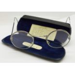 A pair of 1940's WWII spectacles, worn inside a respirator, cased