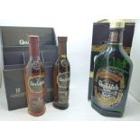 A bottle of Glenfiddich Pure Malt Scotch Whisky and two of a three bottle set of Glenfiddich
