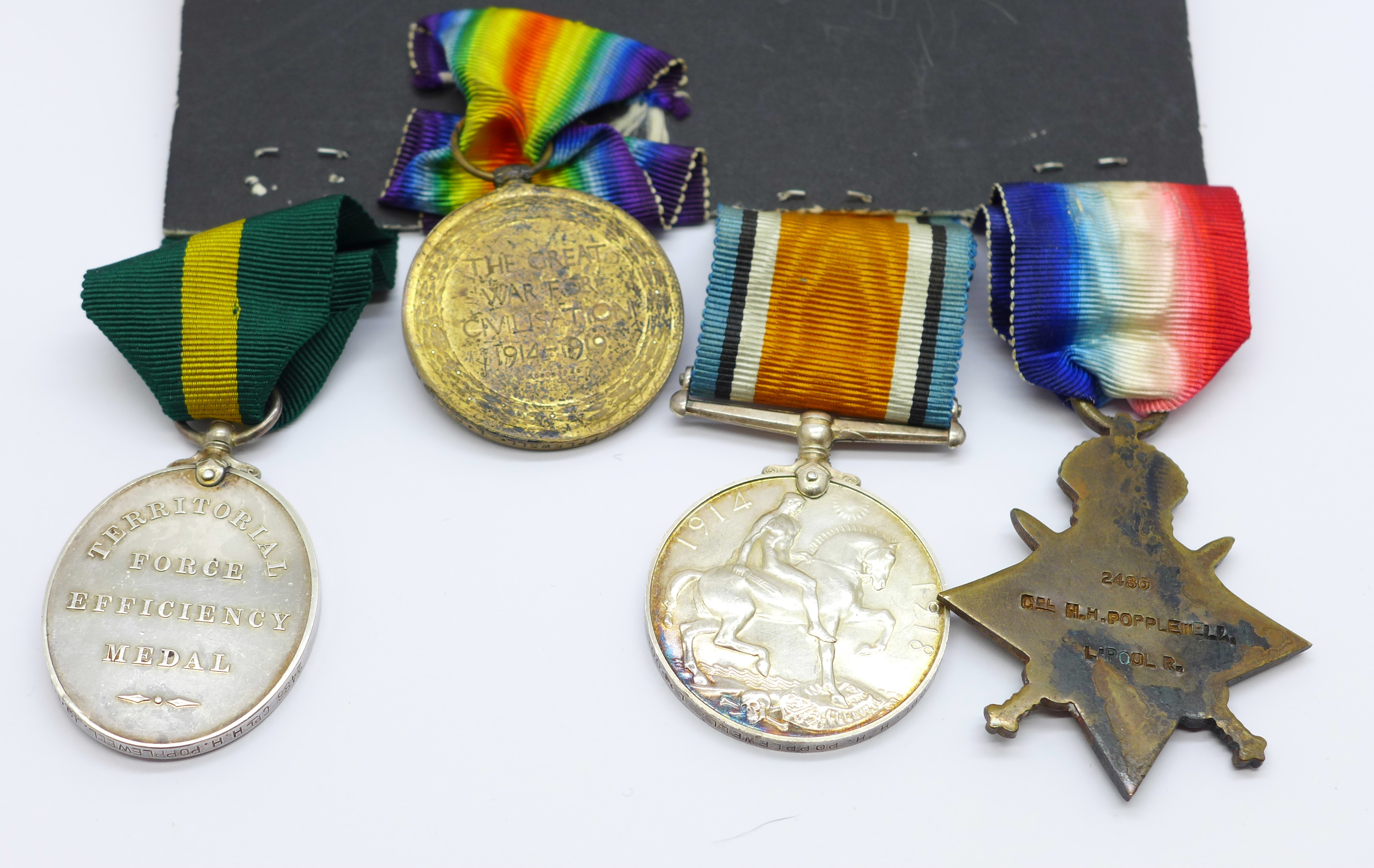 Four medals; WWI trio and Territorial Efficiency medal to 2486 Cpl. H.H. Popplewell 10/L'Pool R. - Image 3 of 11