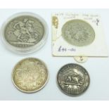 An 1888 crown, a 1918 one rupee, a 1879 half crown and an East Africa 1952 1 shilling