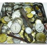 A collection of pocketwatch and wristwatch movements