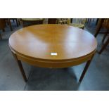 A Stateroom teak circular coffee table