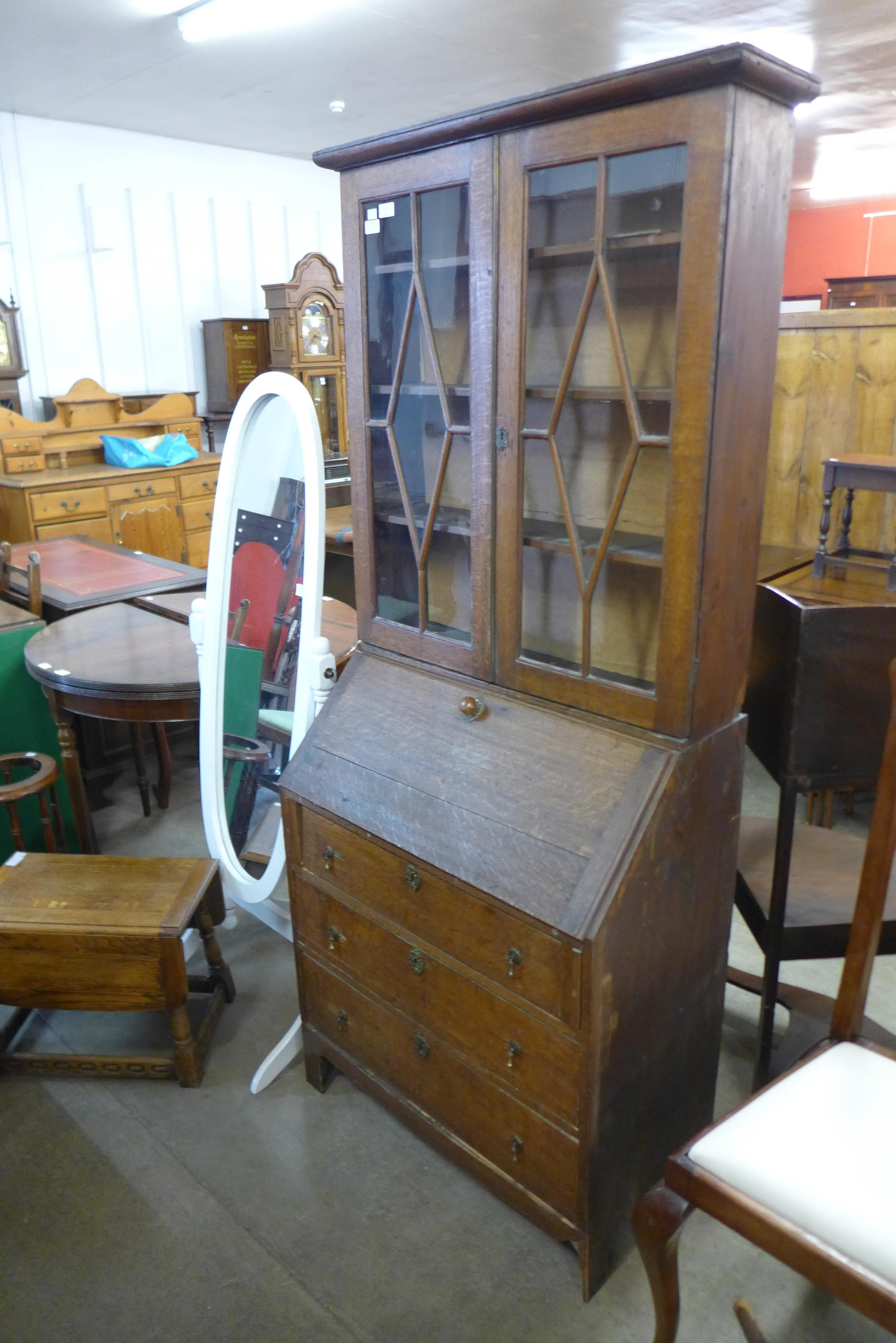 An oak bureau bookcase