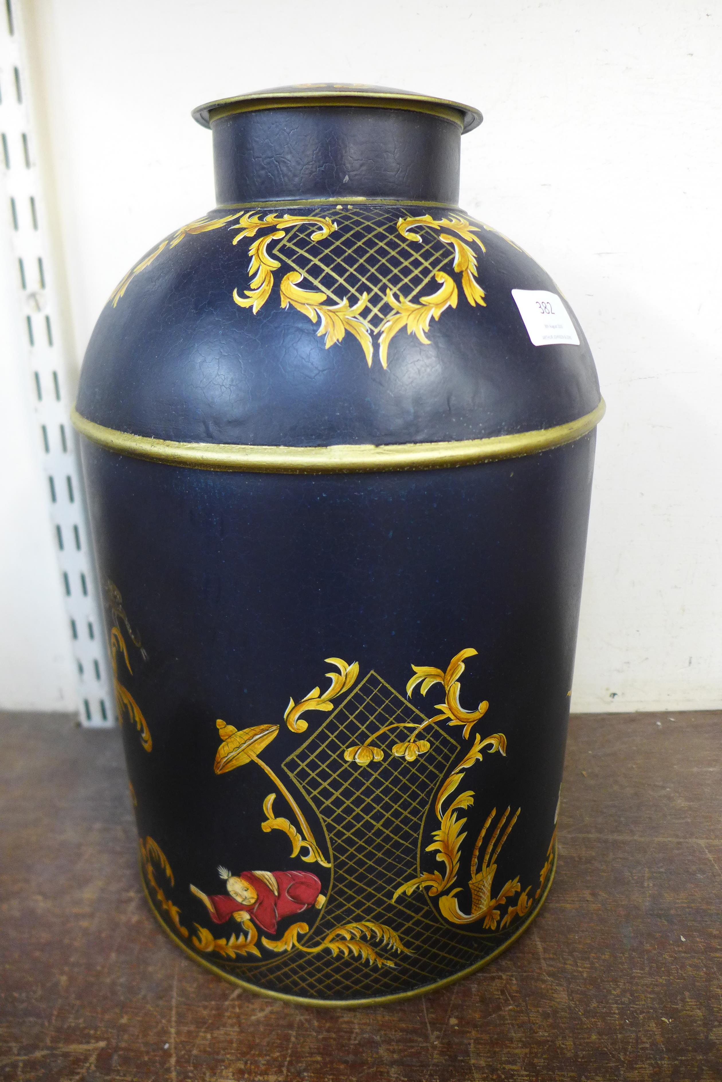 A toleware style blue ginger jar and cover