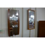 Two teak framed mirrors
