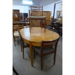 A teak dining table and five G-Plan teak dining chairs