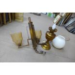 An Art Deco brass electrolier (missing shade) and a brass table lamp