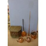 An embossed brass log bin and assorted copperware