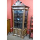 A Moorish inlaid mahogany splay front side cabinet