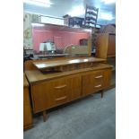 A teak dressing table