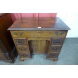 A George II mahogany kneehole desk