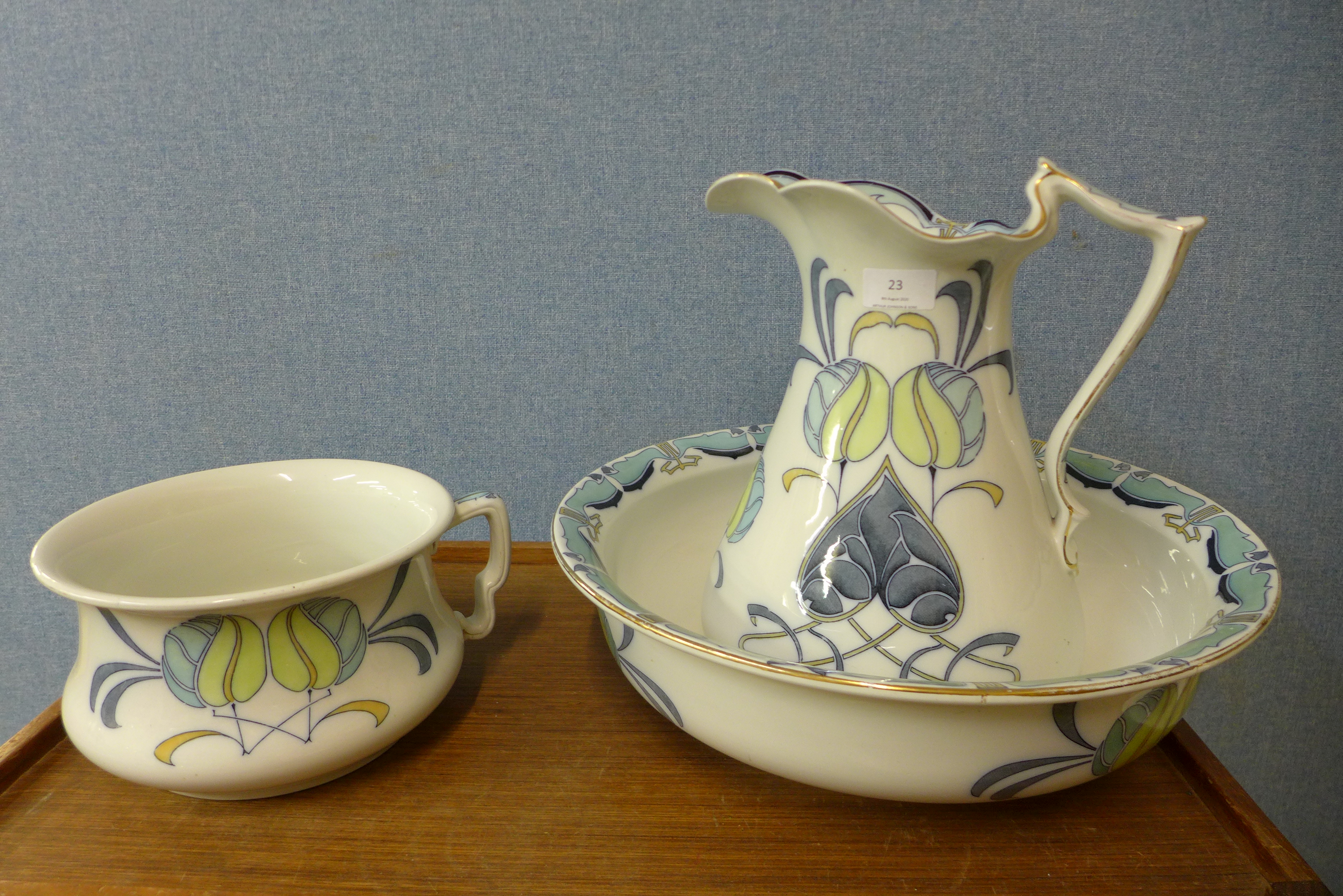 A Staffordshire Art Nouveau transfer printed porcelain wash jug, bowl and chamber pot