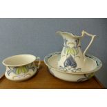 A Staffordshire Art Nouveau transfer printed porcelain wash jug, bowl and chamber pot