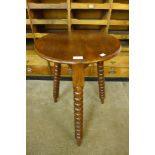 A Victorian style stained pine cricket table