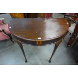 An Edward VII mahogany demi-lune side table