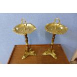 A pair of beech and brass mounted smokers stands