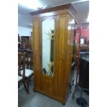 An Edward VII inlaid walnut wardrobe