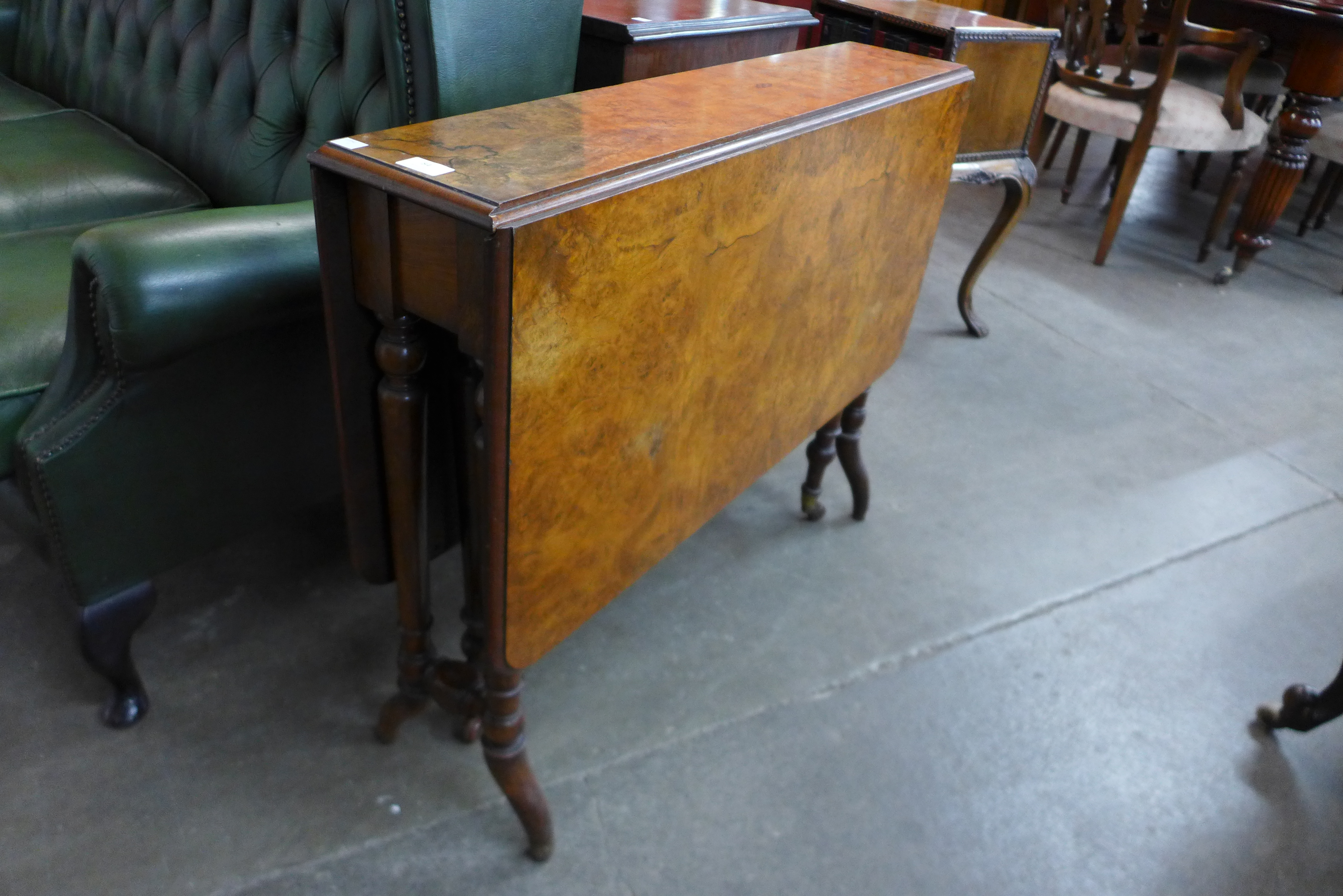 A Victorian figured walnut Sutherland table - Image 2 of 2