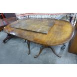 A Regency style mahogany pedestal dining table