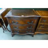 A mahogany serpentine chest of drawers