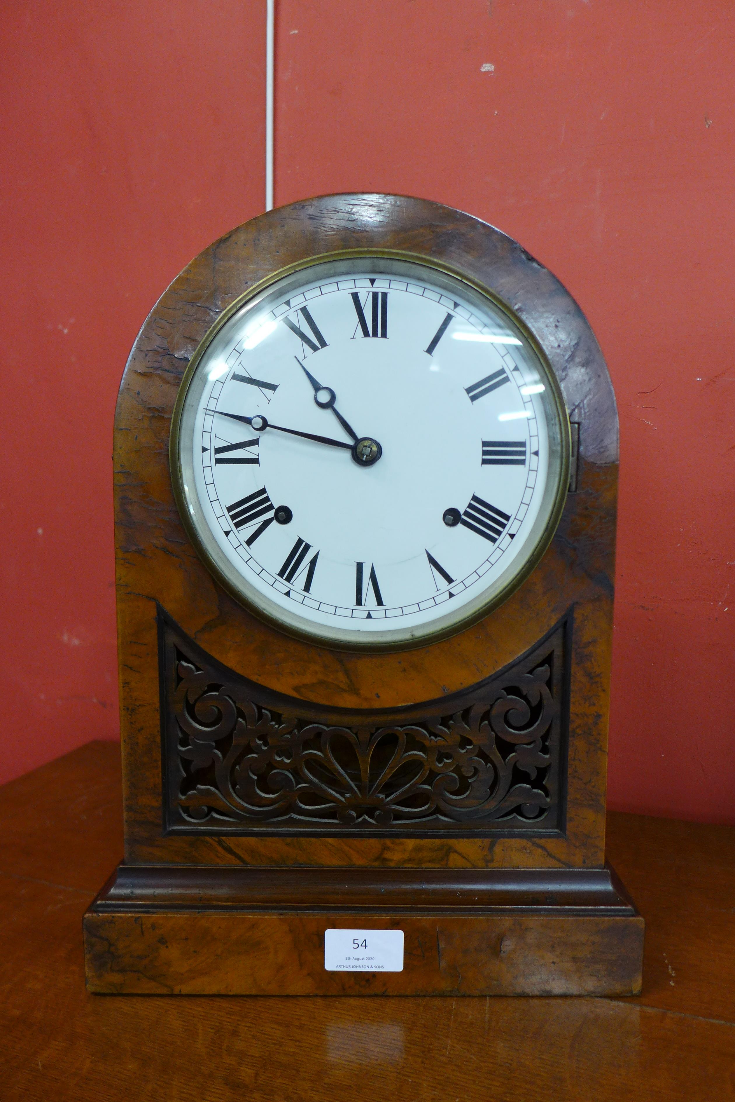 A 19th Century walnut fretwork mantel clock