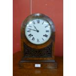 A 19th Century walnut fretwork mantel clock