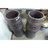 A pair of glazed terracotta chimney pots