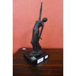 An Art Deco style bronze figure of a female dancer, on black marble socle