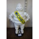 A cast iron Michelin Man figure