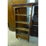 A set of George III style oak wall mounted spice shelves