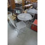 A Kettler metal garden table and two chairs
