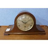 An oak mantel clock