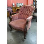 A Victorian mahogany and upholstered armchair