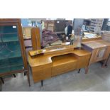 A walnut dressing table