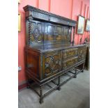 A Jacobean Revival oak geometric moulded buffet sideboard, on barleytwist legs