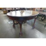 A Victorian mahogany dining table