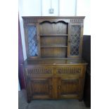 A carved oak dresser