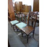 A pair of George III elm chairs and a Victorian carved oak side chair