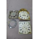 Three longcase clock dials