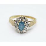 A 9ct gold, blue stone and diamond cluster ring, 2g, N