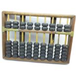 An early 20th Century Chinese Abacus, 26cm wide