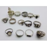 Thirteen silver rings and two white metal rings